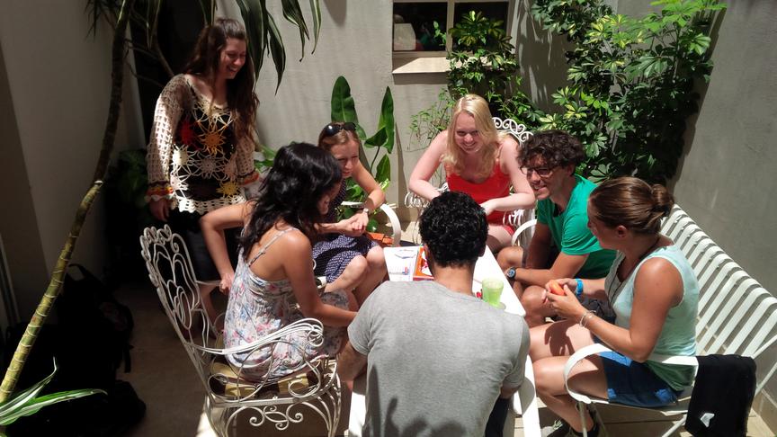 Verbum students learning together in the school patio