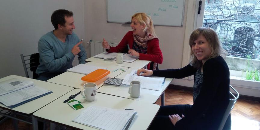 Students participating in a mini group Spanish class at Verbum